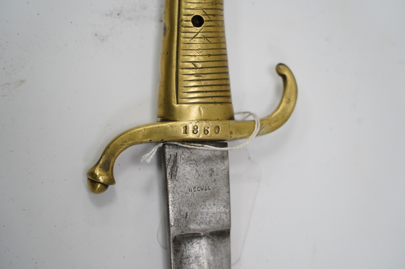 A composite short sword, British military blade by Reeves with Continental brass hilt, blade 66.5cm. Condition - fair